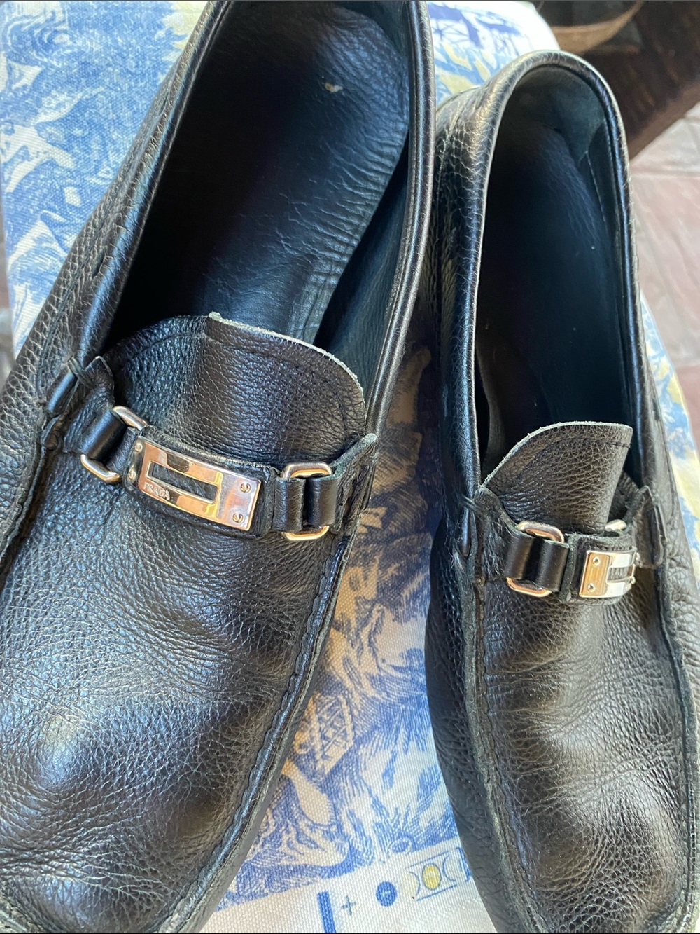 Prada Black Leather Loafers with Silver Buckle